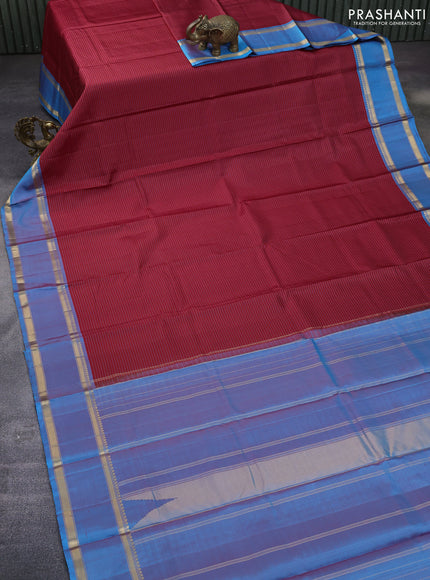 Pure kanchipuram silk saree red and cs blue with allover stripes pattern and rettapet zari woven border