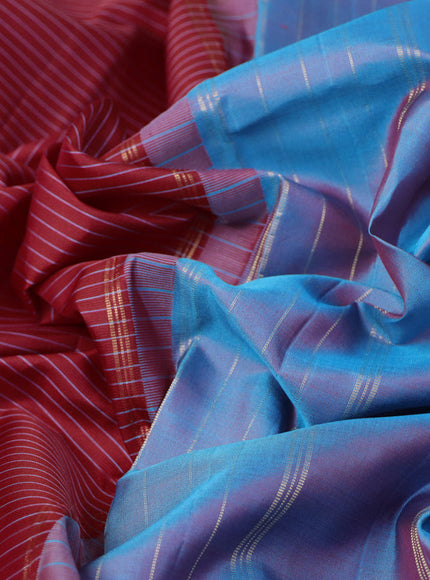 Pure kanchipuram silk saree red and cs blue with allover stripes pattern and rettapet zari woven border