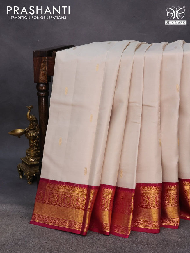 Pure kanchipuram silk saree pastel grey shade and dark magenta pink with zari woven buttas and rich zari woven korvai border