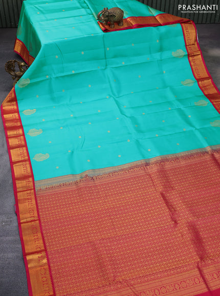 Pure kanchipuram silk saree teal blue and pink with zari woven buttas and zari woven korvai border