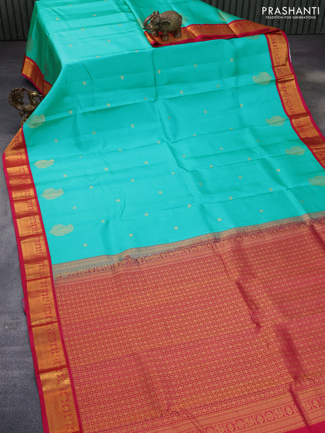 Pure kanchipuram silk saree teal blue and pink with zari woven buttas and zari woven korvai border