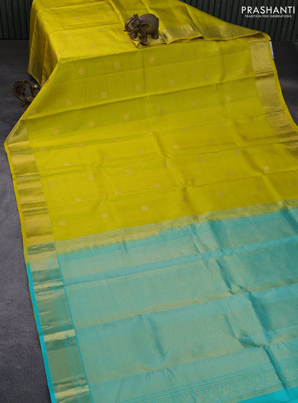 Pure kanchipuram silk saree lime yellow and light blue with allover zari checks & buttas and zari woven border