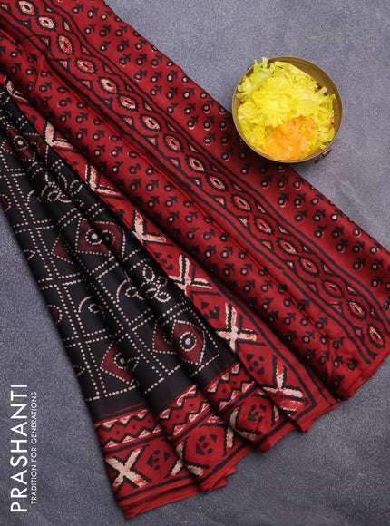 Modal silk saree black and maroon with allover prints and printed border