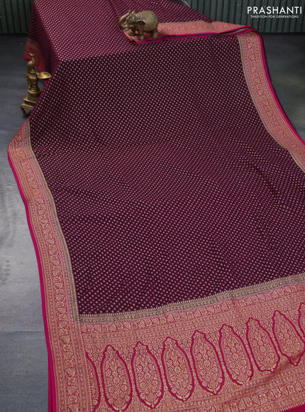 Banarasi georgette saree wine shade and pink with allover thread & zari woven butta weaves and woven border