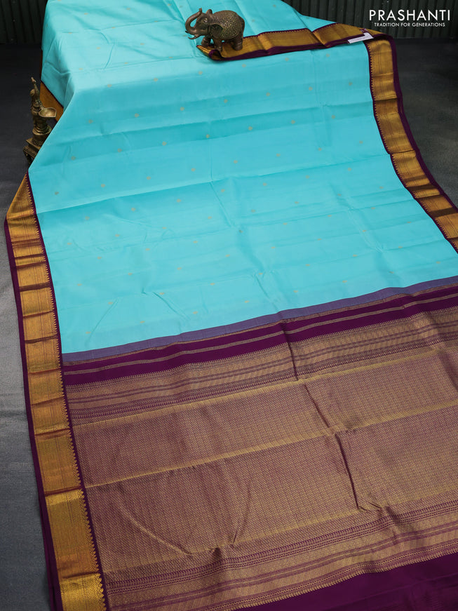 Pure kanchipuram silk saree teal blue and wine shade with zari woven buttas and zari woven korvai border