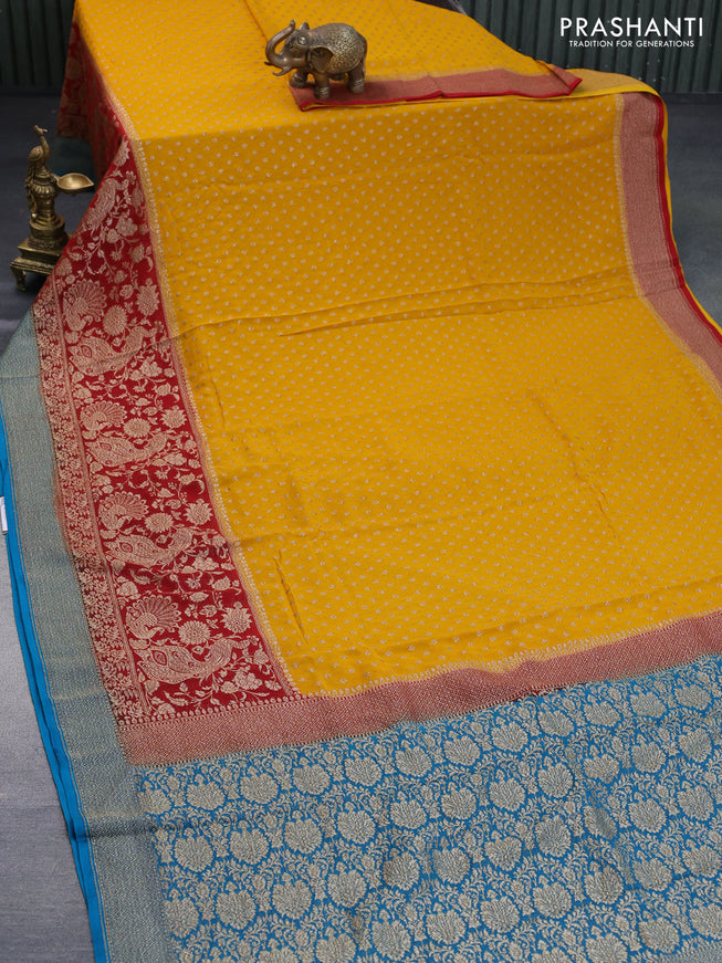 Banarasi georgette saree mustard yellow and maroon cs blue with allover thread & zari butta weaves and long woven border