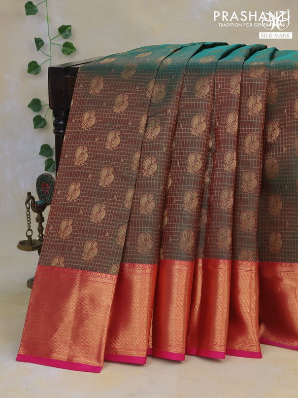 Pure kanchipuram silk saree dual shade of greenish red and pink with allover zari woven brocade weaves and rich zari woven border