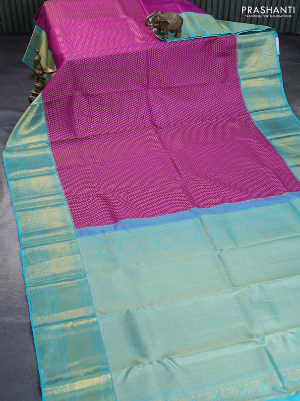 Pure kanchipuram silk saree purple and teal blue with allover zari woven brocade weaves and rich long zari woven border