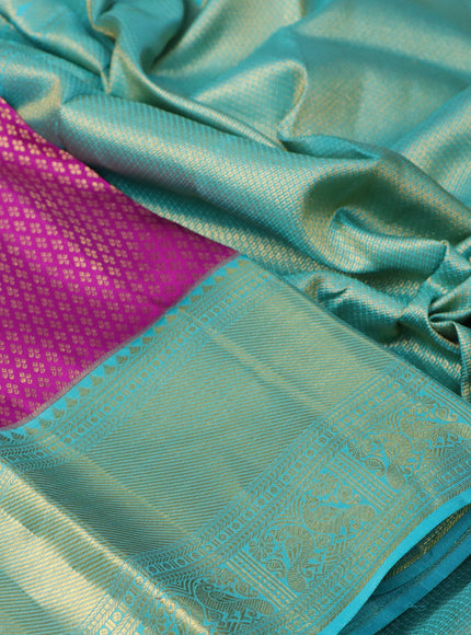 Pure kanchipuram silk saree purple and teal blue with allover zari woven brocade weaves and rich long zari woven border