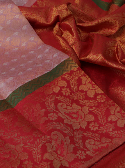 Pure kanchipuram silk saree pastel pink and red with allover zari woven brocade weaves and rich paisley zari woven border