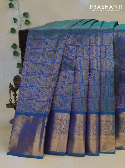 Pure kanchipuram silk saree dual shade of bluish green with allover zari woven brocade weaves and rich zari woven border