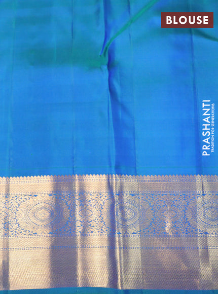 Pure kanchipuram silk saree dual shade of bluish green with allover zari woven brocade weaves and rich zari woven border