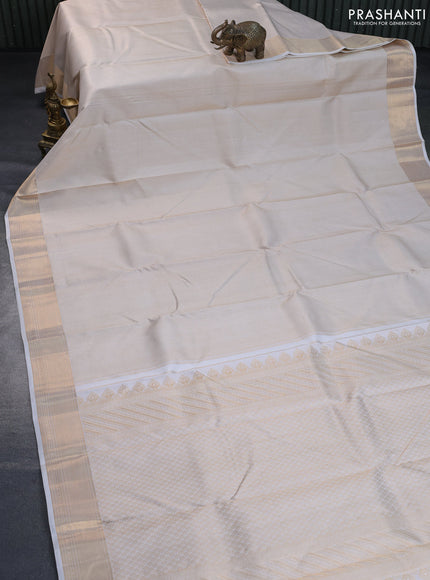 Pure kanchipuram silk saree off white with allover zari woven brocade weaves and rich zari woven border