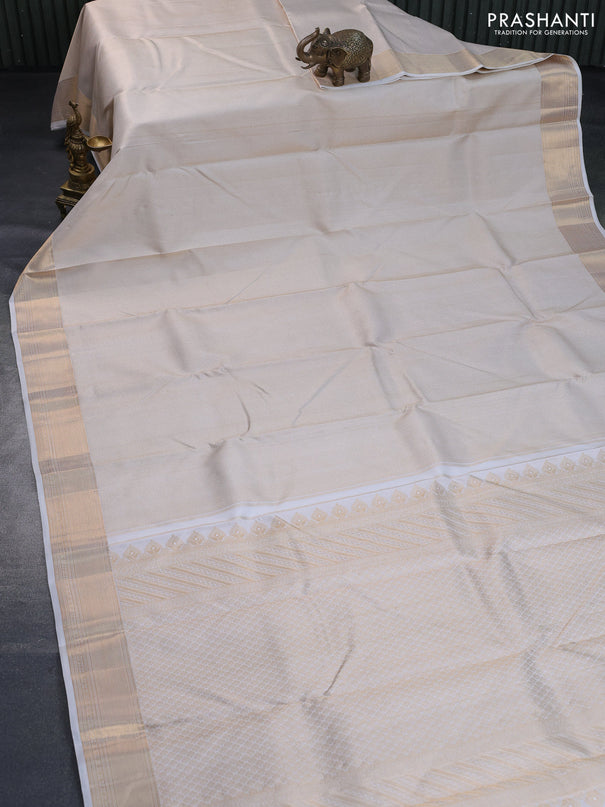 Pure kanchipuram silk saree off white with allover zari woven brocade weaves and rich zari woven border