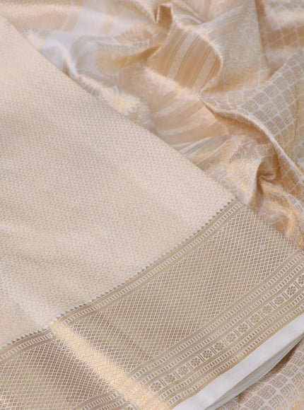 Pure kanchipuram silk saree off white with allover zari woven brocade weaves and rich zari woven border