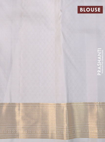 Pure kanchipuram silk saree off white with allover zari woven brocade weaves and rich zari woven border