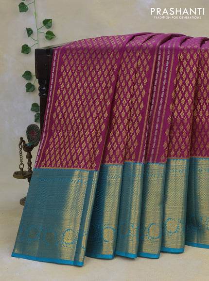 Pure kanchipuram silk saree purple and teal blue with allover zari woven brocade weaves and long rich zari woven border