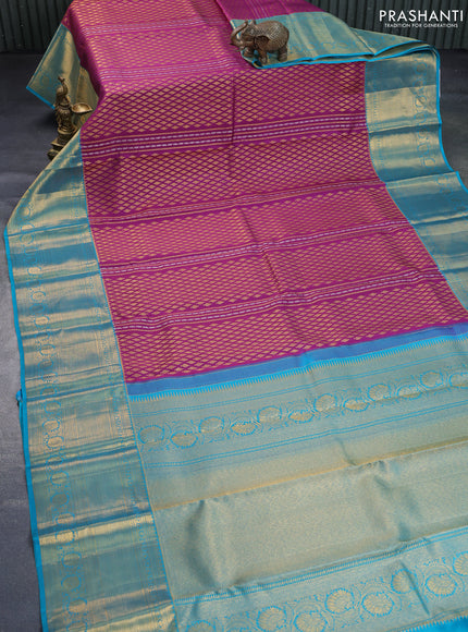 Pure kanchipuram silk saree purple and teal blue with allover zari woven brocade weaves and long rich zari woven border