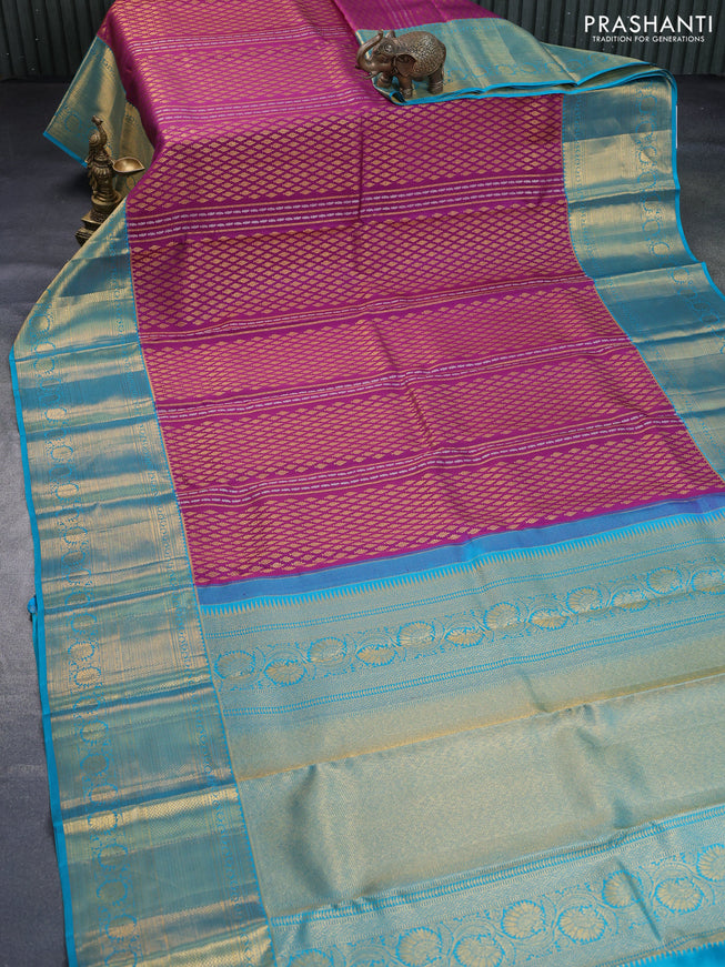 Pure kanchipuram silk saree purple and teal blue with allover zari woven brocade weaves and long rich zari woven border