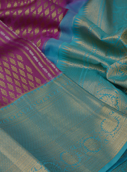 Pure kanchipuram silk saree purple and teal blue with allover zari woven brocade weaves and long rich zari woven border