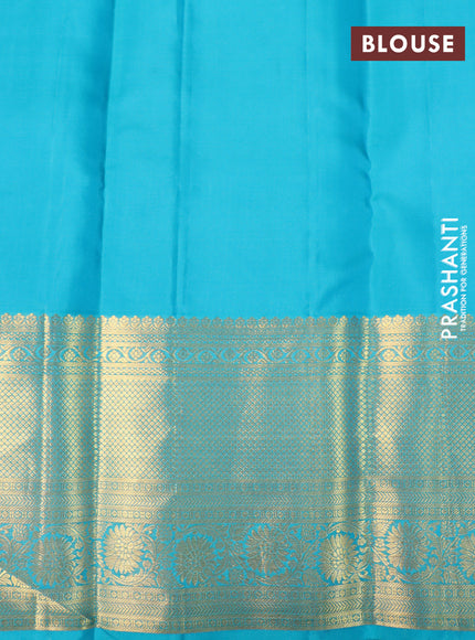 Pure kanchipuram silk saree purple and teal blue with allover zari woven brocade weaves and long rich zari woven border