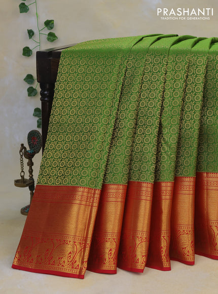 Pure kanchipuram silk saree green and red with allover zari woven brocade weaves and long rich zari woven border