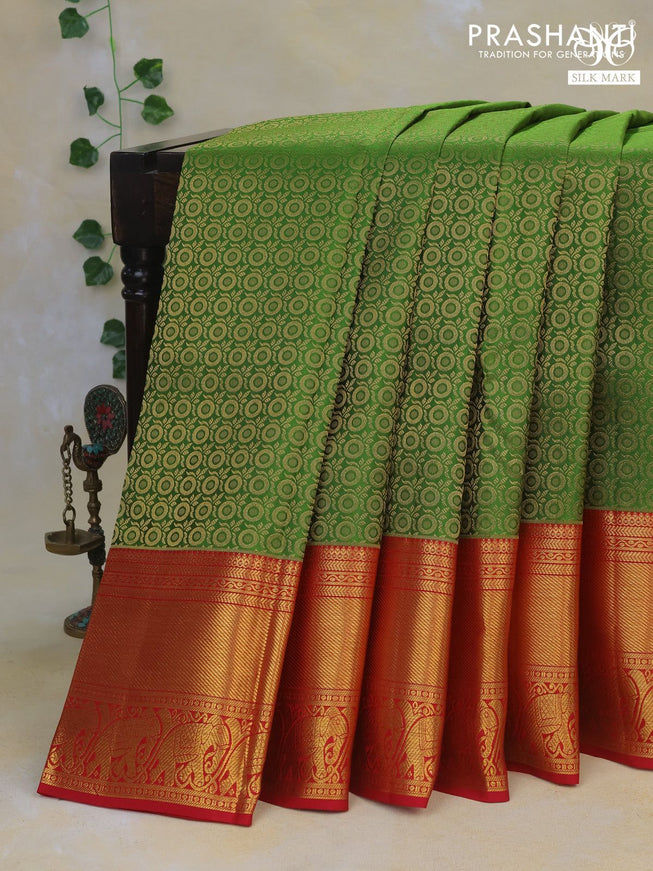 Pure kanchipuram silk saree green and red with allover zari woven brocade weaves and long rich zari woven border