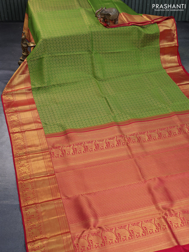 Pure kanchipuram silk saree green and red with allover zari woven brocade weaves and long rich zari woven border