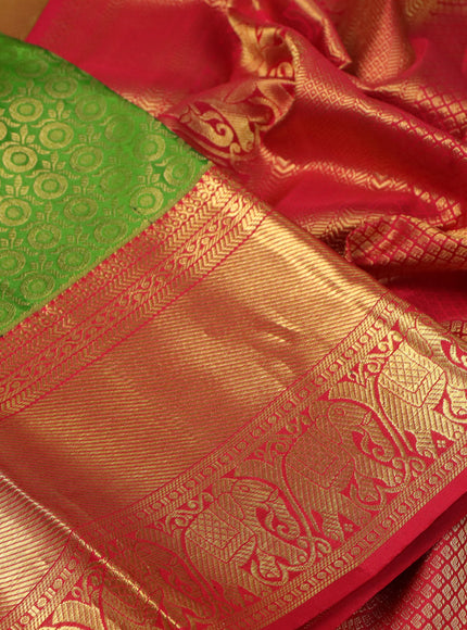 Pure kanchipuram silk saree green and red with allover zari woven brocade weaves and long rich zari woven border