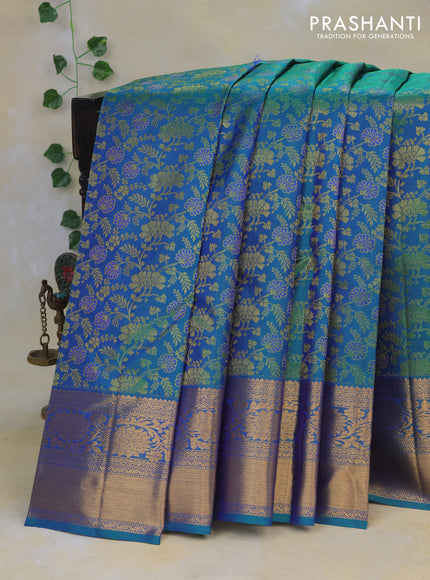 Pure kanchipuram silk saree dual shade of bluish green with allover zari woven floral brocade weaves and long rich zari woven border