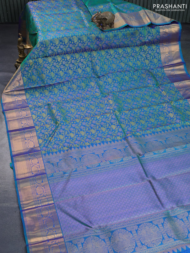 Pure kanchipuram silk saree dual shade of bluish green with allover zari woven floral brocade weaves and long rich zari woven border