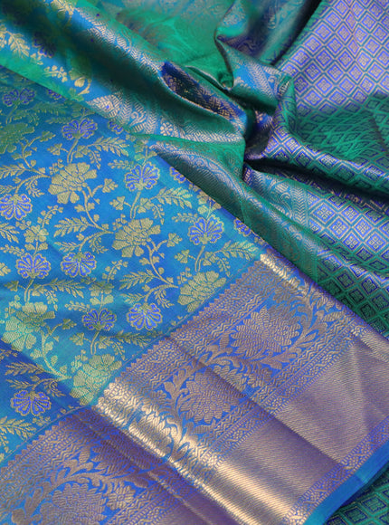 Pure kanchipuram silk saree dual shade of bluish green with allover zari woven floral brocade weaves and long rich zari woven border