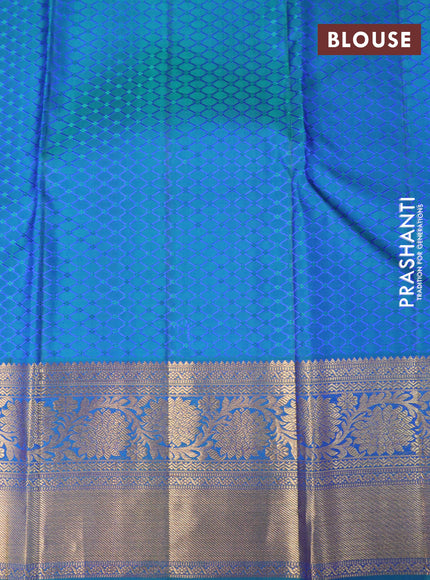 Pure kanchipuram silk saree dual shade of bluish green with allover zari woven floral brocade weaves and long rich zari woven border