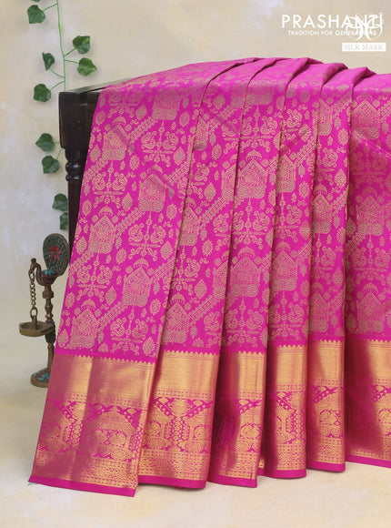 Pure kanchipuram silk saree magenta pink with allover zari woven brocade weaves and long rich zari woven border