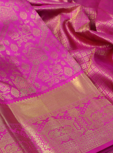 Pure kanchipuram silk saree magenta pink with allover zari woven brocade weaves and long rich zari woven border