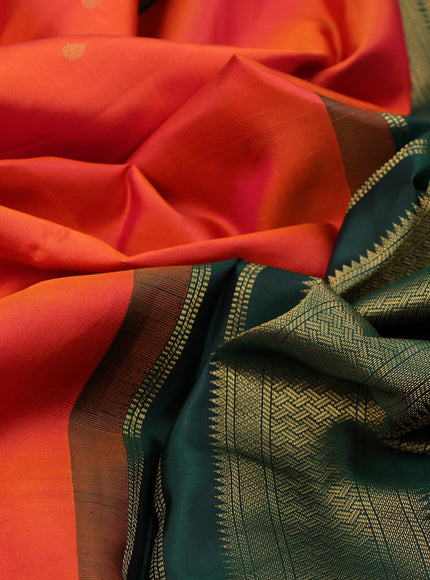 Pure kanchipuram silk saree dual shade of rustic orange and dark green with zari woven buttas and zari woven korvai border