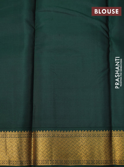 Pure kanchipuram silk saree dual shade of rustic orange and dark green with zari woven buttas and zari woven korvai border