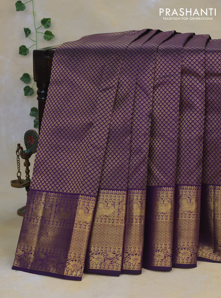 Pure kanchipuram silk saree violet with allover zari woven brocade weaves and long rich zari woven border