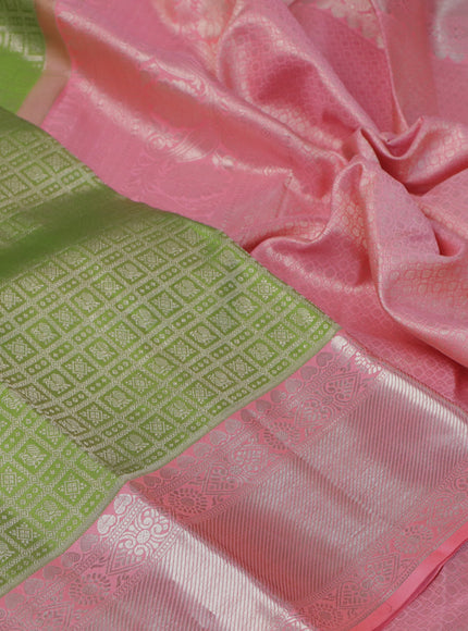 Pure kanchipuram silk saree light green and peach pink with allover zari woven brocade weaves and long rich zari woven border