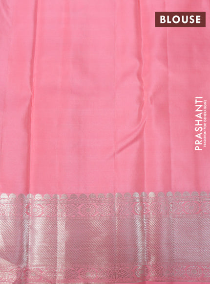 Pure kanchipuram silk saree light green and peach pink with allover zari woven brocade weaves and long rich zari woven border