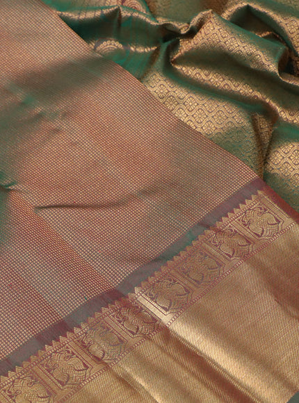 Pure kanchipuram silk saree dual shade of green with allover zari weaves and rich zari woven border