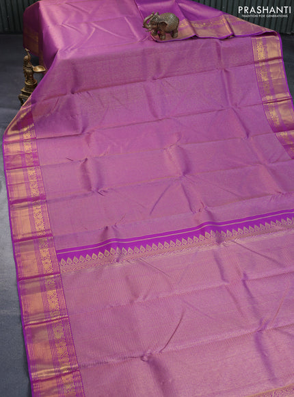 Pure kanchipuram silk saree purple shade with allover zari weaves and rich annam zari woven border