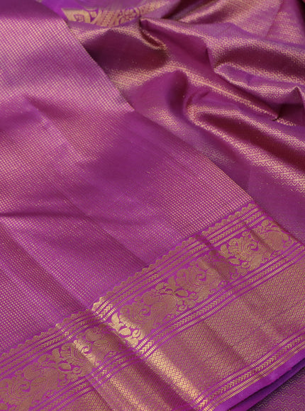 Pure kanchipuram silk saree purple shade with allover zari weaves and rich annam zari woven border