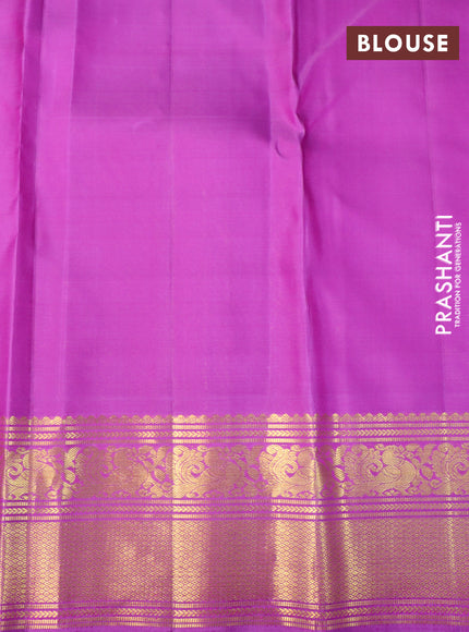 Pure kanchipuram silk saree purple shade with allover zari weaves and rich annam zari woven border