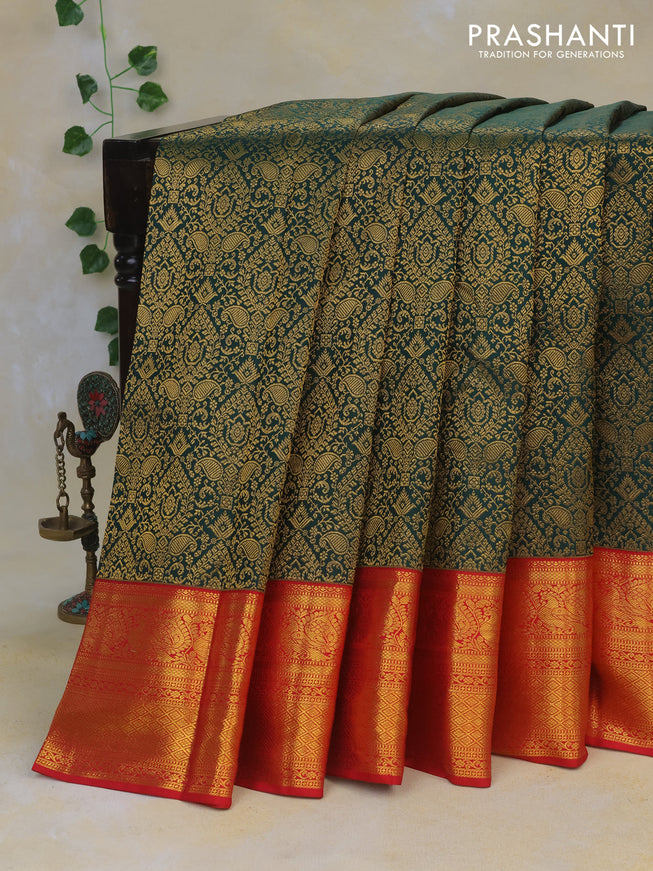 Pure kanchipuram silk saree bottle green and red with allover zari woven brocade weaves and rich zari woven border