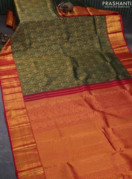 Pure kanchipuram silk saree bottle green and red with allover zari woven brocade weaves and rich zari woven border