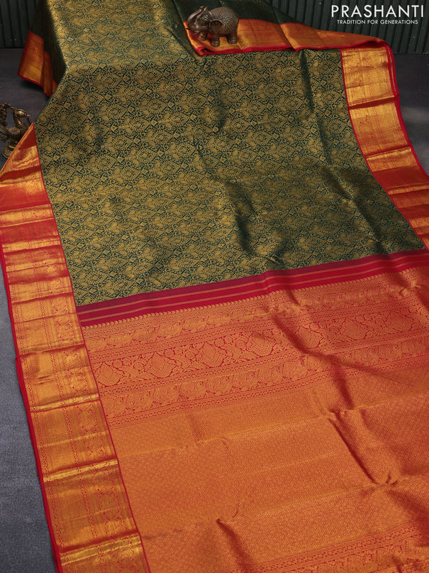 Pure kanchipuram silk saree bottle green and red with allover zari woven brocade weaves and rich zari woven border