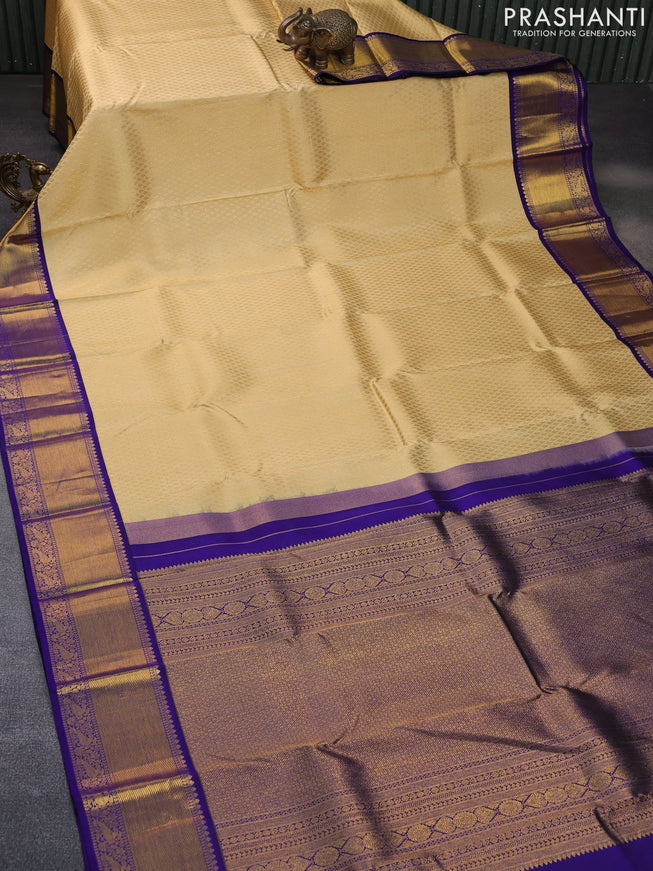 Pure kanchipuram silk saree sandal and blue with allover zari woven brocade weaves and rich zari woven border