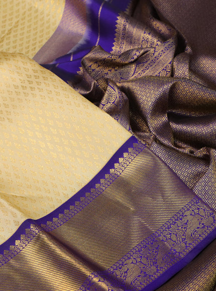 Pure kanchipuram silk saree sandal and blue with allover zari woven brocade weaves and rich zari woven border