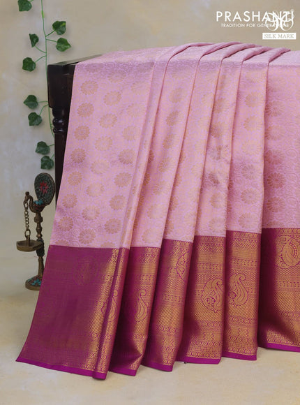 Pure kanchipuram silk saree light pink and purple with allover zari woven floral brocade weaves and long rich zari woven border